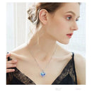 Engelvleugel hanger met kristallen - Blauw-paarse gloed - 50