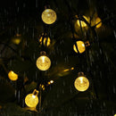 Lichtsnoer op zonne-energie 6,5m - 30 LED glasbollen warmwit
