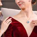 Engelvleugel hanger met kristallen - Blauw-paarse gloed - 50