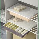 Verstelbaar opbergrek met uitschuifbare separator, kledingka